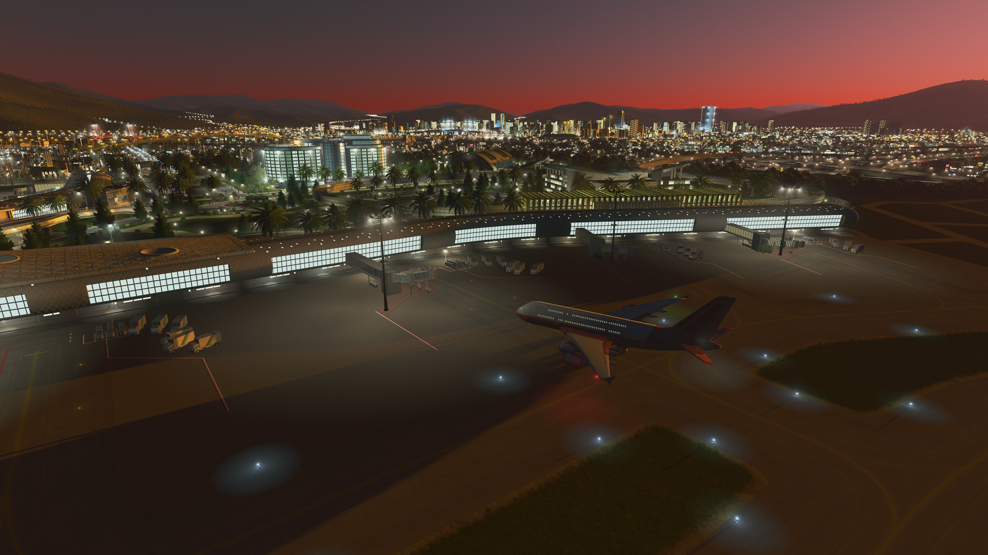 Cities Skylines Airports Screenshot with an Airport Terminal and a Plane Taxing at Night